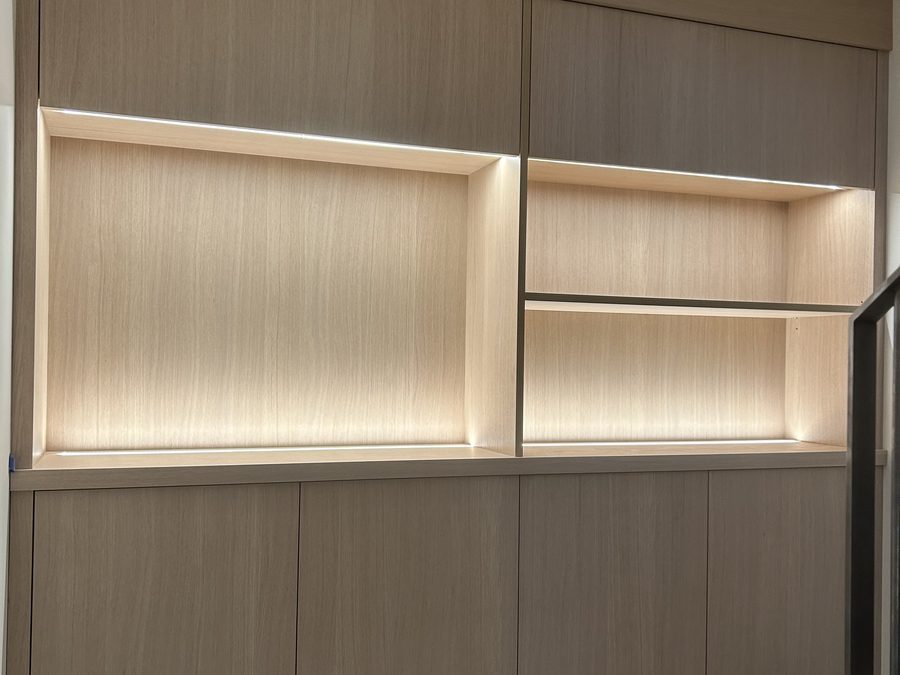 LED shelf lighting in built-in cabinetry